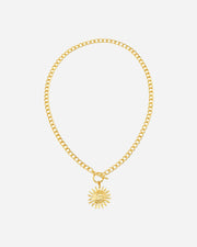 Gold chain necklace with a sunflower pendant on a white background
