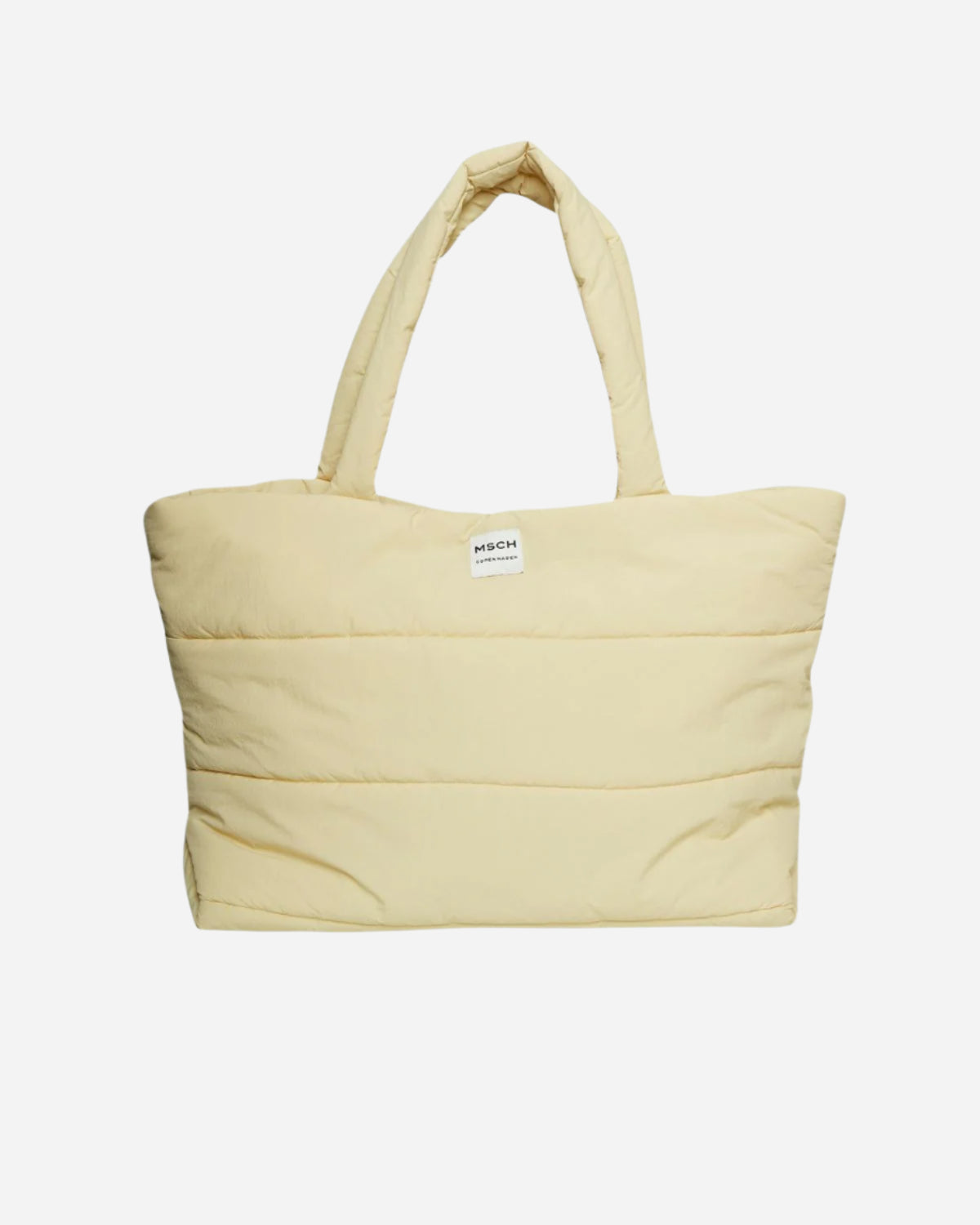 Butter yellow tote bag with a visible brand label on a white background