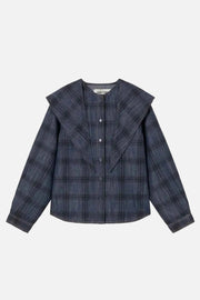 A navy blue plaid button-up shirt jacket with a wide collar, laid flat against a light cream background.