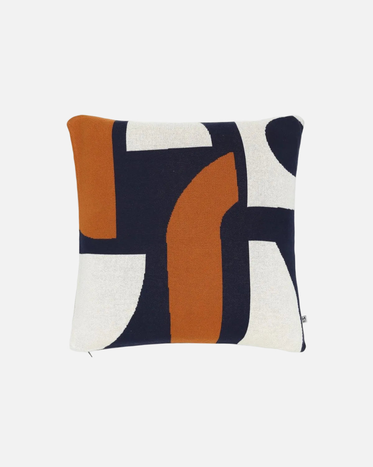 A square throw pillow featuring a modern abstract geometric pattern in navy blue, terracotta orange, and off-white on a clean white background.
