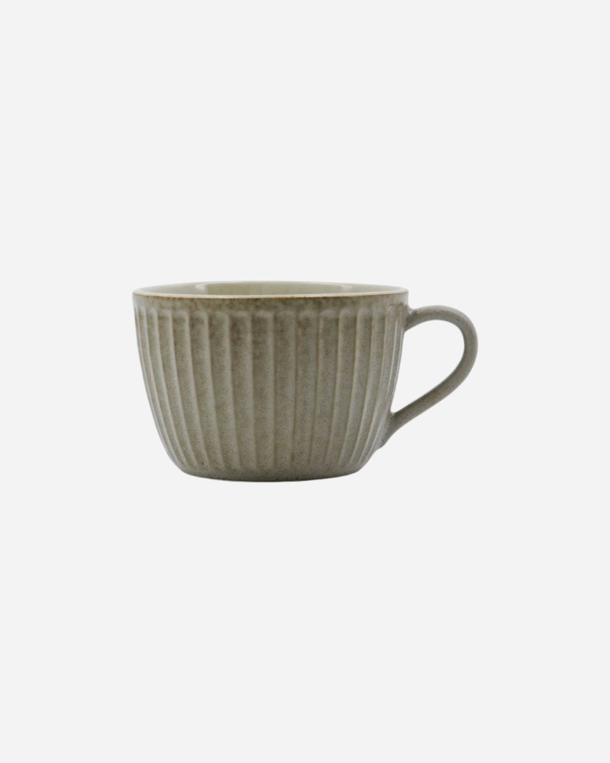 Green ceramic mug with textured design on a white background