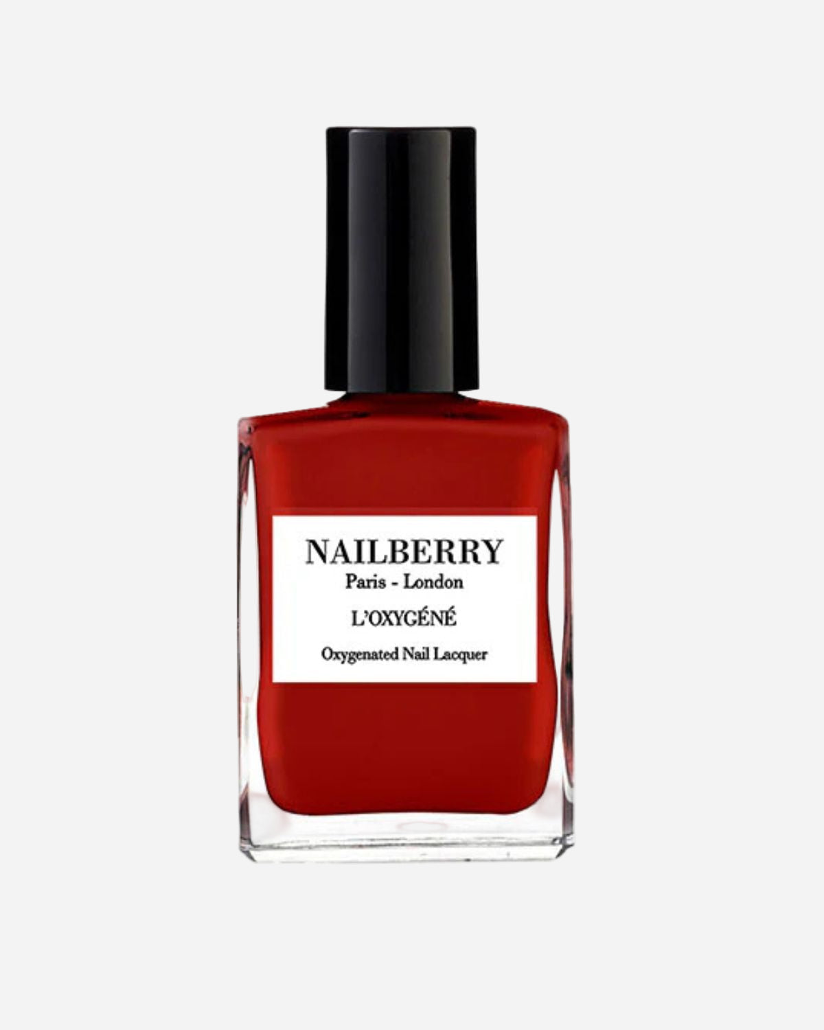 Red nail polish bottle with black cap on a white background