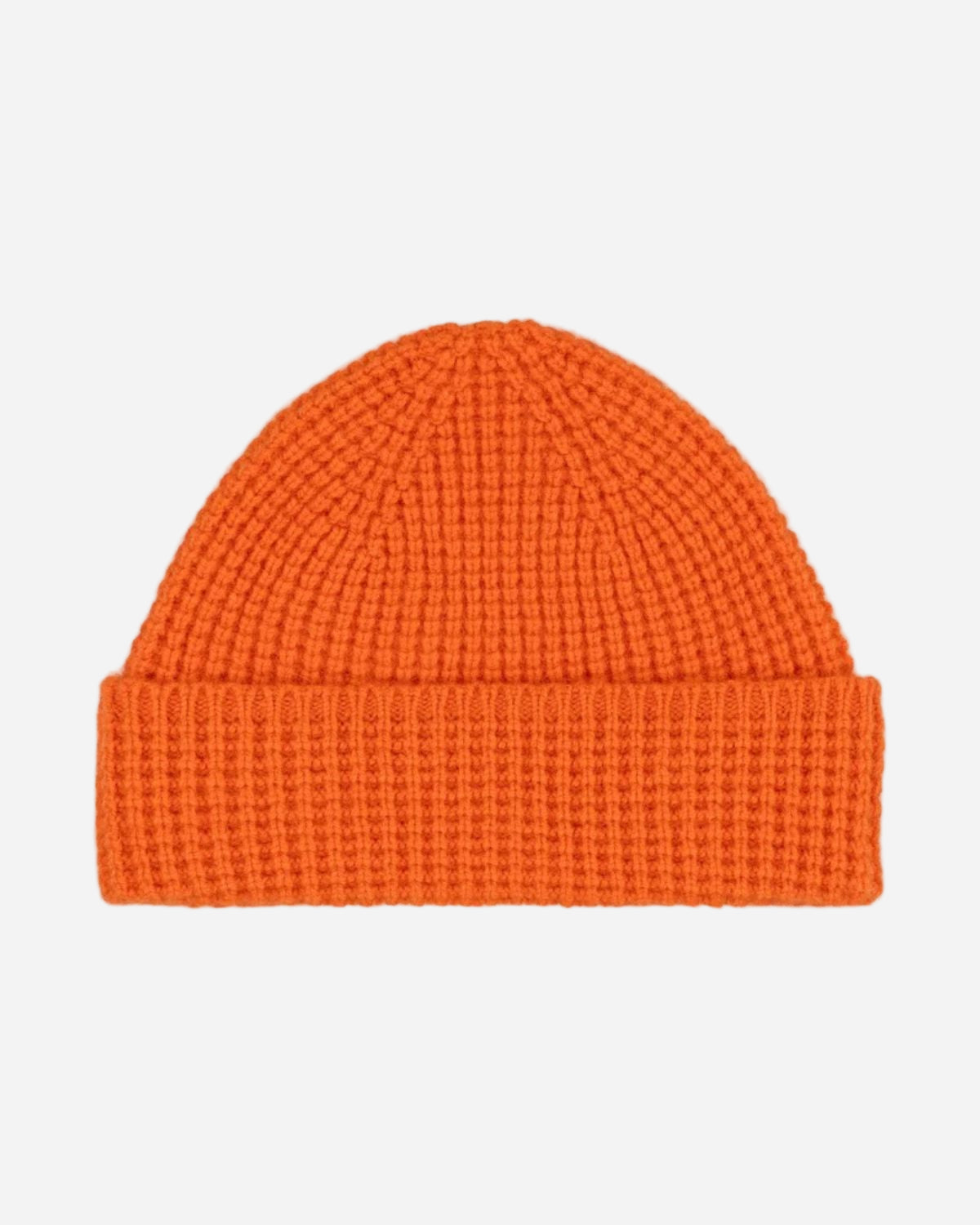 Orange knit beanie on a white background