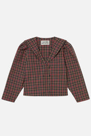 A cropped long-sleeve plaid top by New York and Sydney, featuring a red, green, and black tartan pattern with structured shoulders, laid flat against a light cream background.