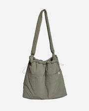 Green shoulder bag on a white background