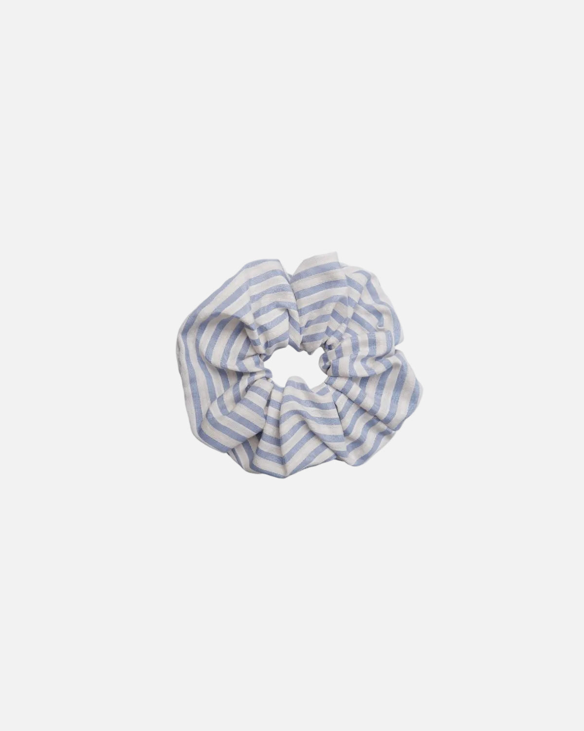 A fabric scrunchie with a light blue and white striped pattern, centered on a solid white background.