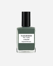 Green nail polish bottle with black cap on a white background