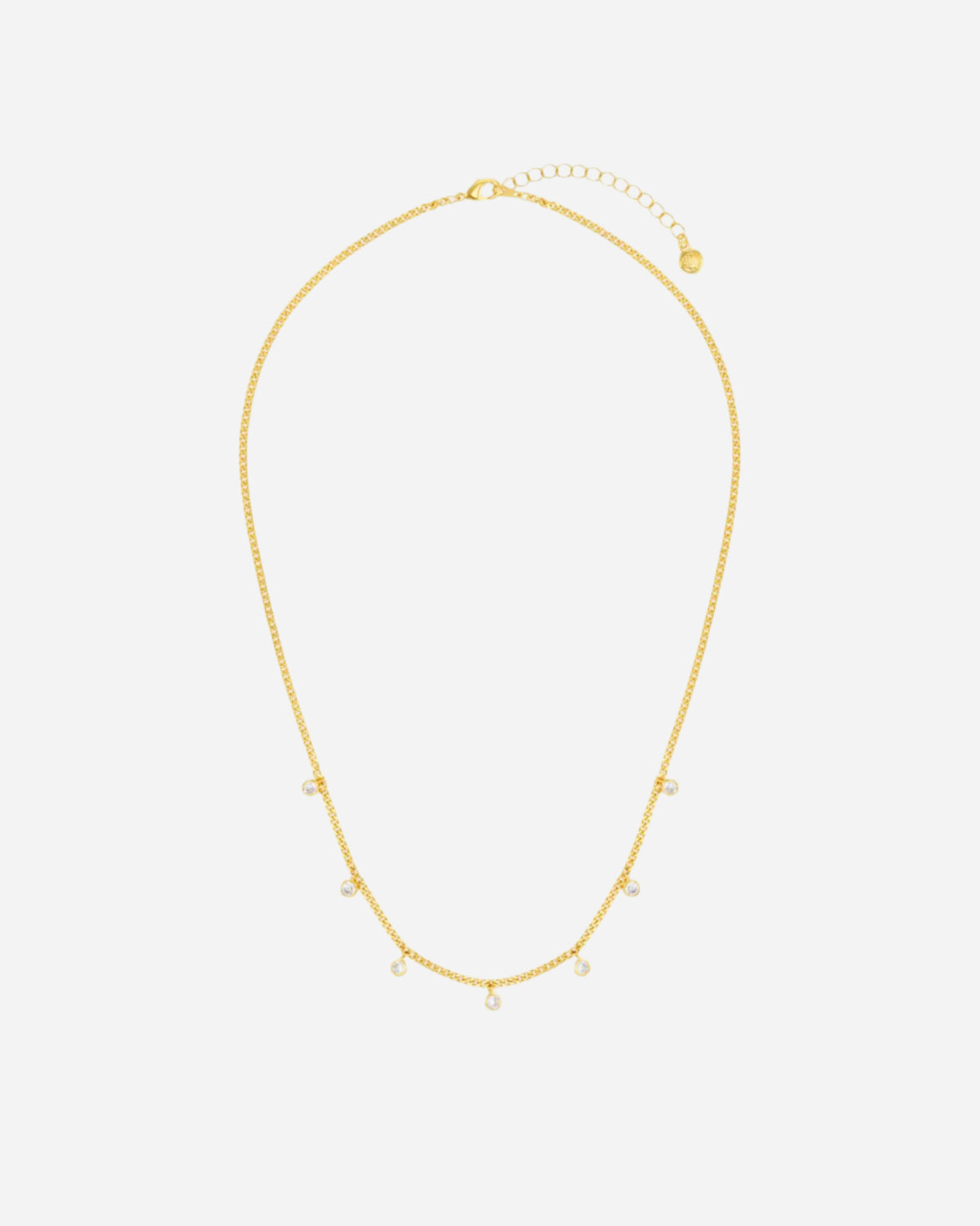 Gold necklace on a white background