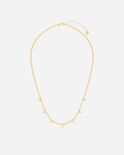 Gold necklace on a white background