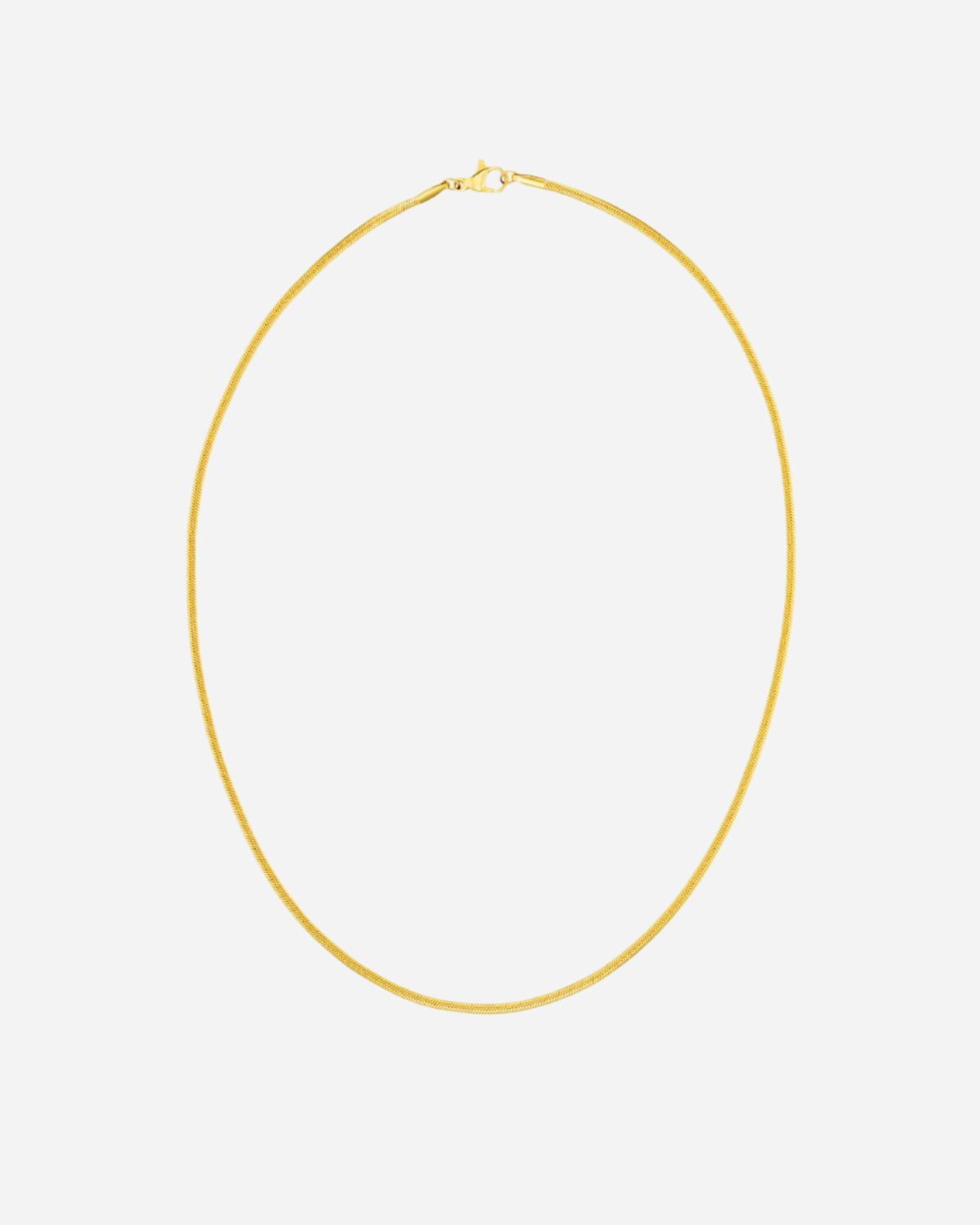 Gold necklace on a white background