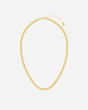 Gold necklace on a white background
