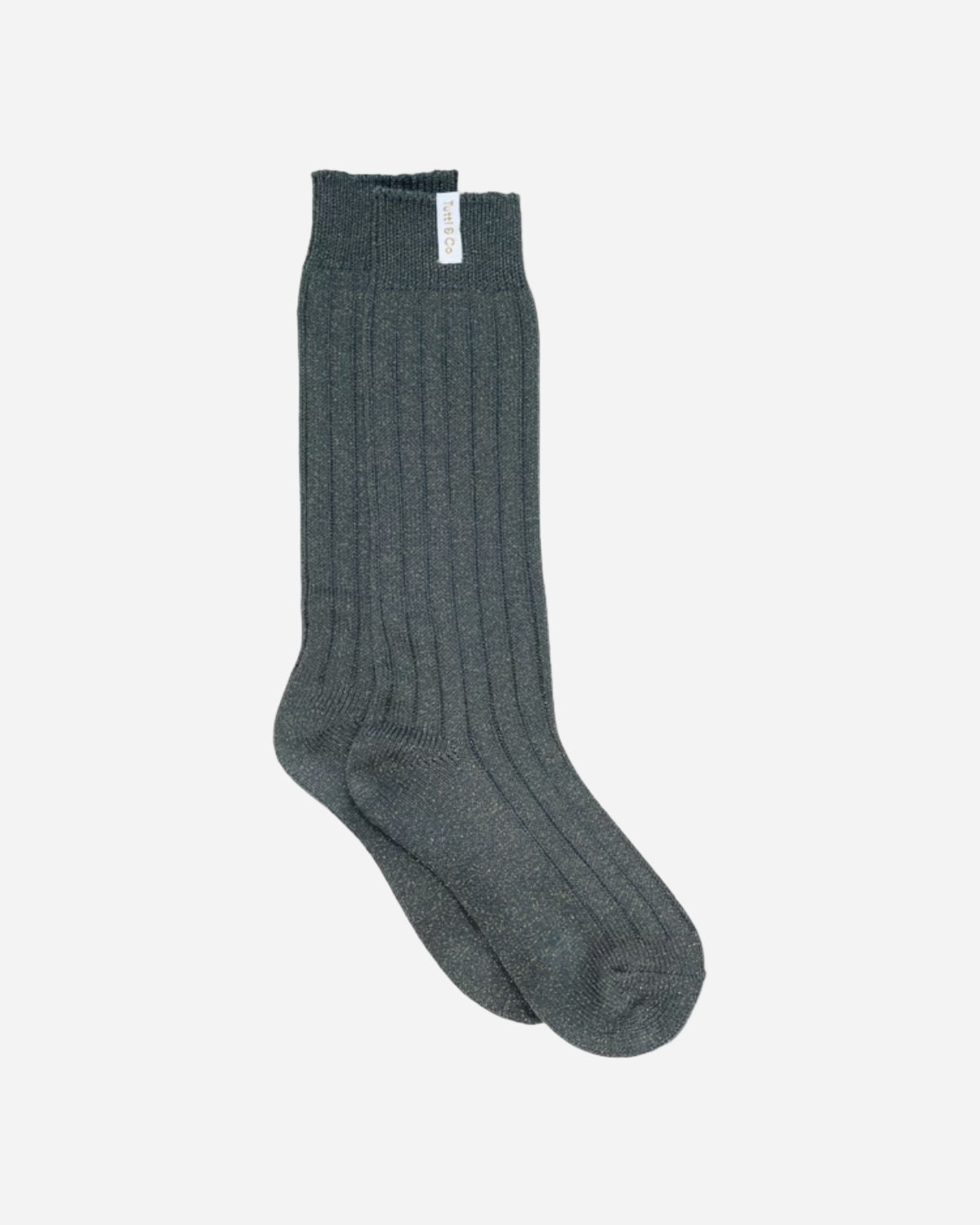 Dark green sock on a white background