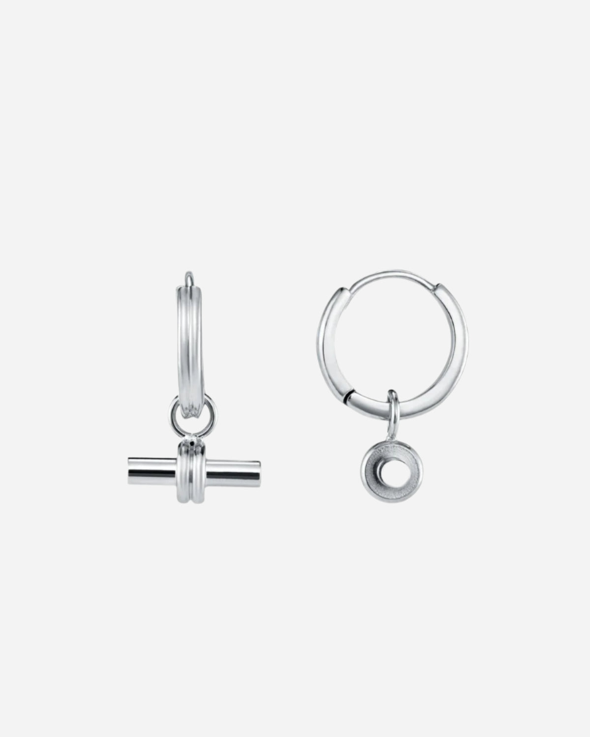 Pair of silver hoop earrings with small t-bar charms on a white background