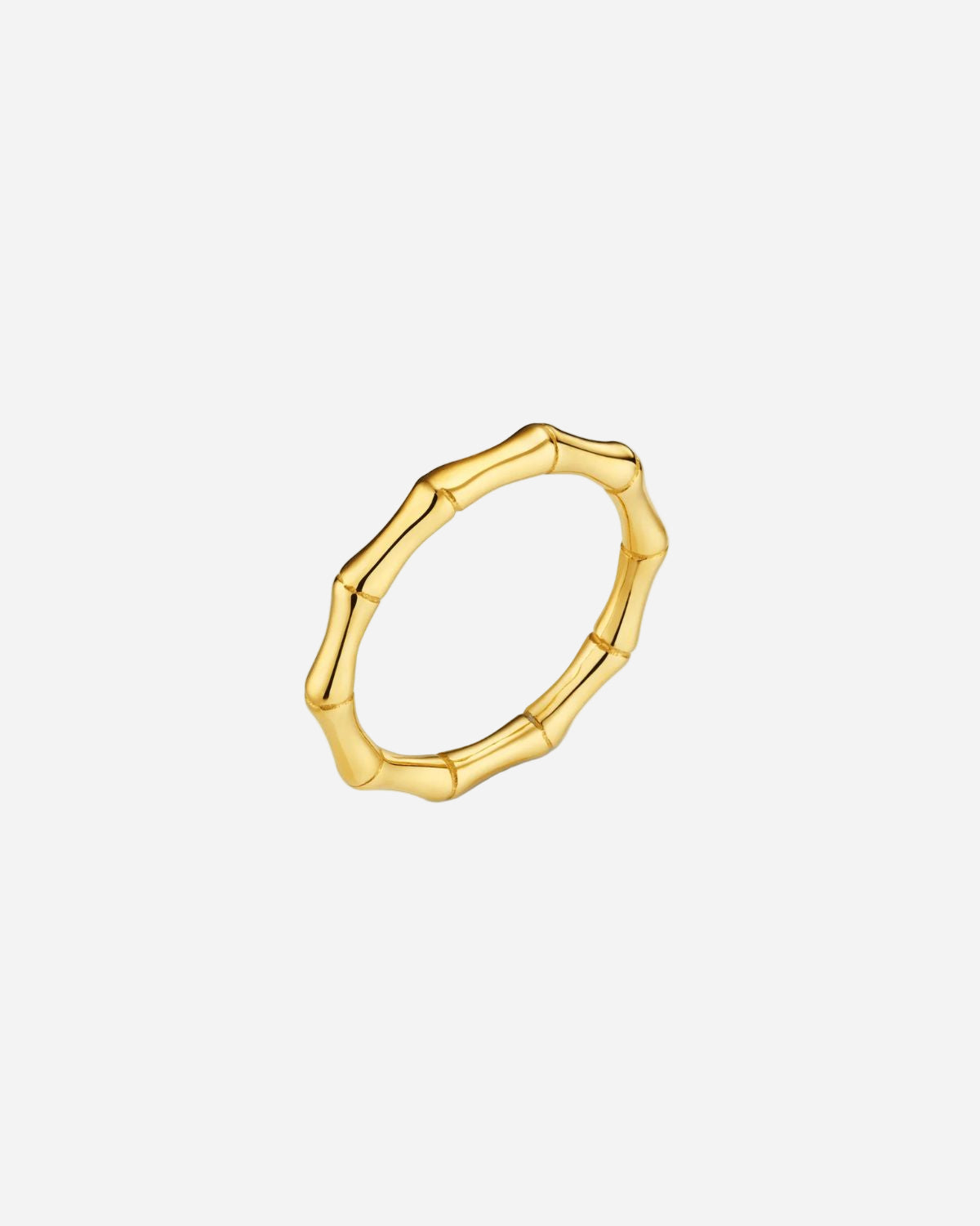 Gold ring with a unique design on a white background