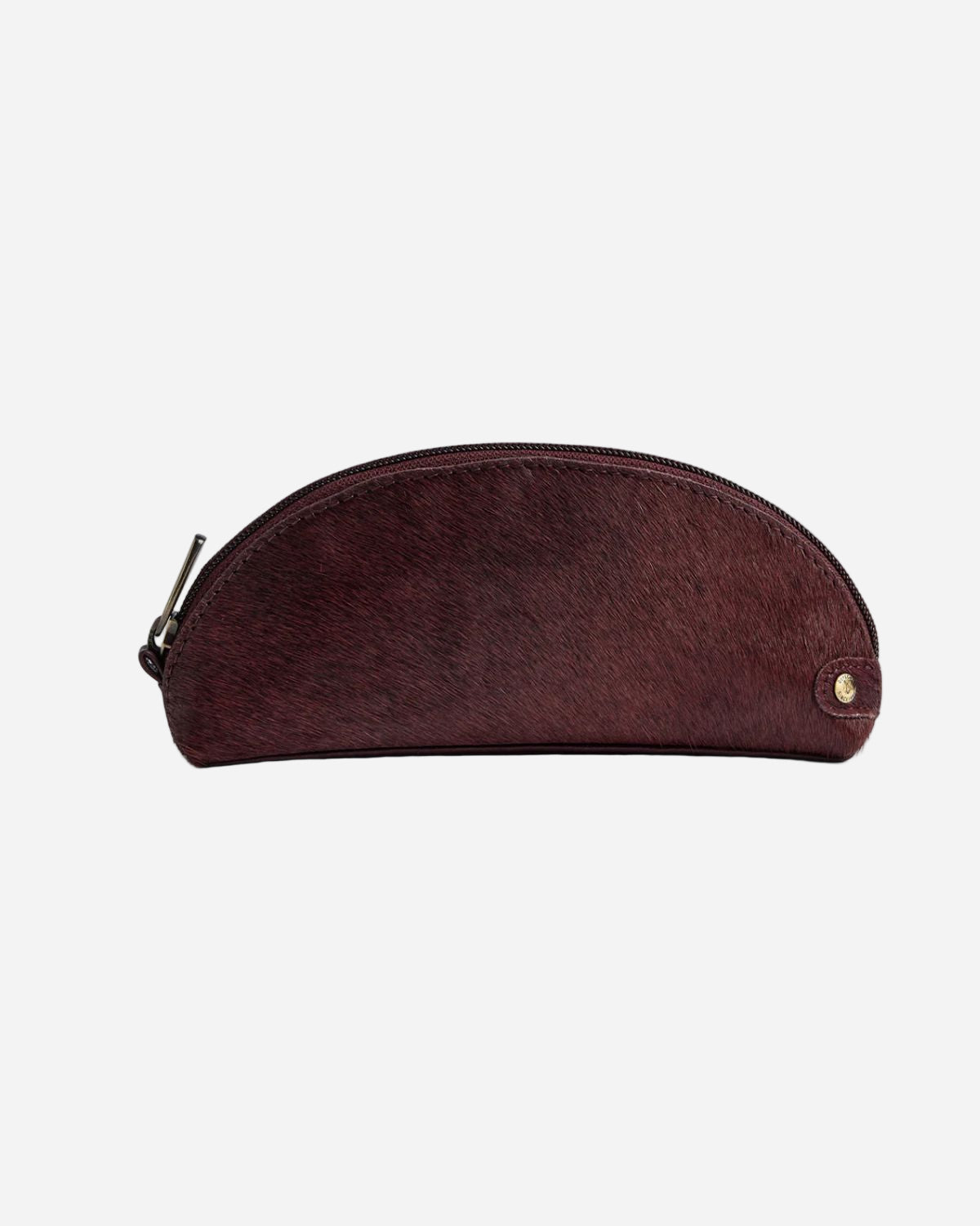 OX BLOOD leather pouch with a gold zipper on a white background