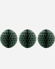Three green honeycomb balls on a white background