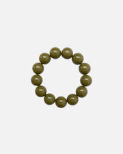 A beaded stretch bracelet made of glossy, olive green round beads, displayed on a clean white background.