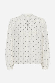 White blouse with black pattern on a white background
