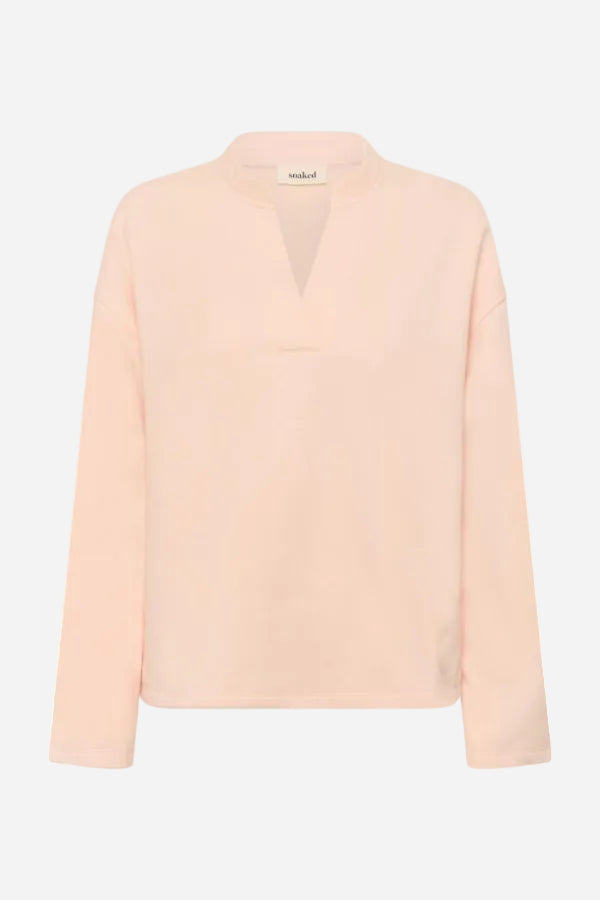 Light pink sweat with a V-neck on a white background