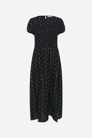 Black dress with white pattern on a white background