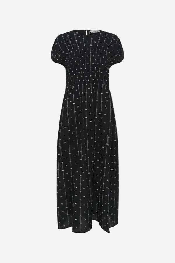 Black dress with white pattern on a white background