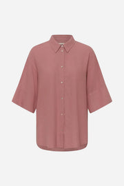 Pink shirt with short sleeves on a white background