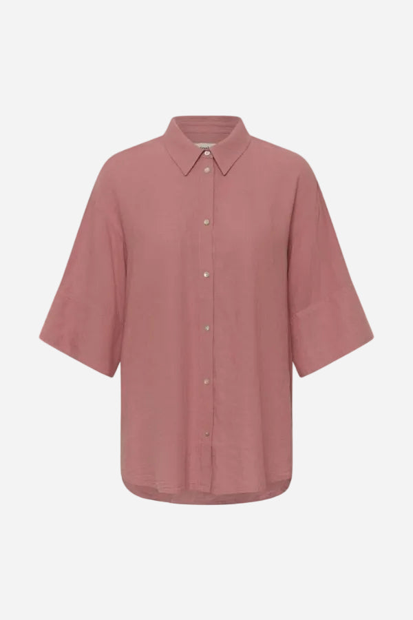 Pink shirt with short sleeves on a white background