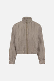 A cropped zip-up jacket with a high stand collar, featuring a beige and brown plaid pattern, displayed on a clean white background.