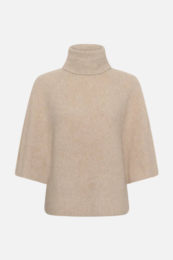 A beige ribbed knit turtleneck sweater with wide, cape-like sleeves, shown against a plain white background.
