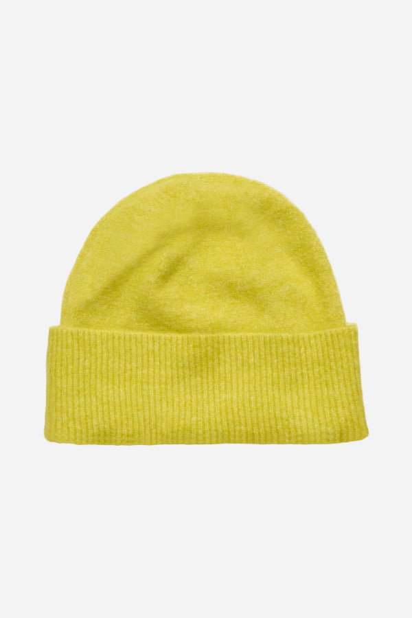 Yellow beanie hat on a white background