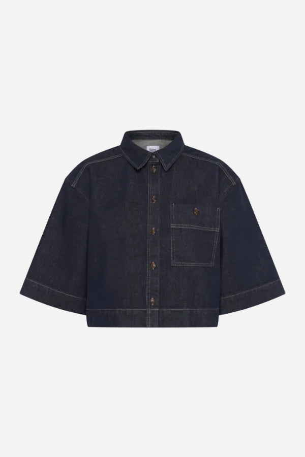 Dark denim shirt with a collar on a white background