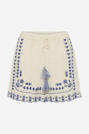 Beige shorts with blue floral embroidery and a tassel on a white background