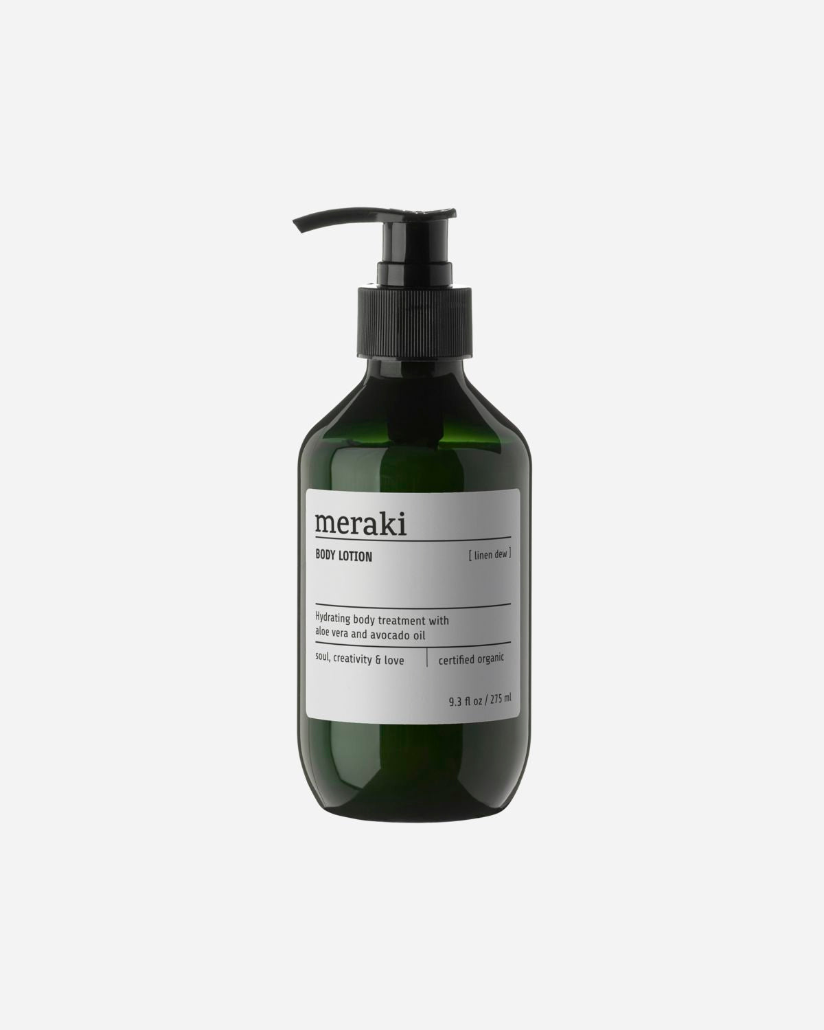 A pump bottle of Meraki body lotion with the label 'LINEN DEW' and text indicating organic ingredients.