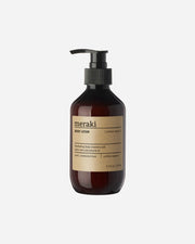 Brown bottle with a black pump on a white background