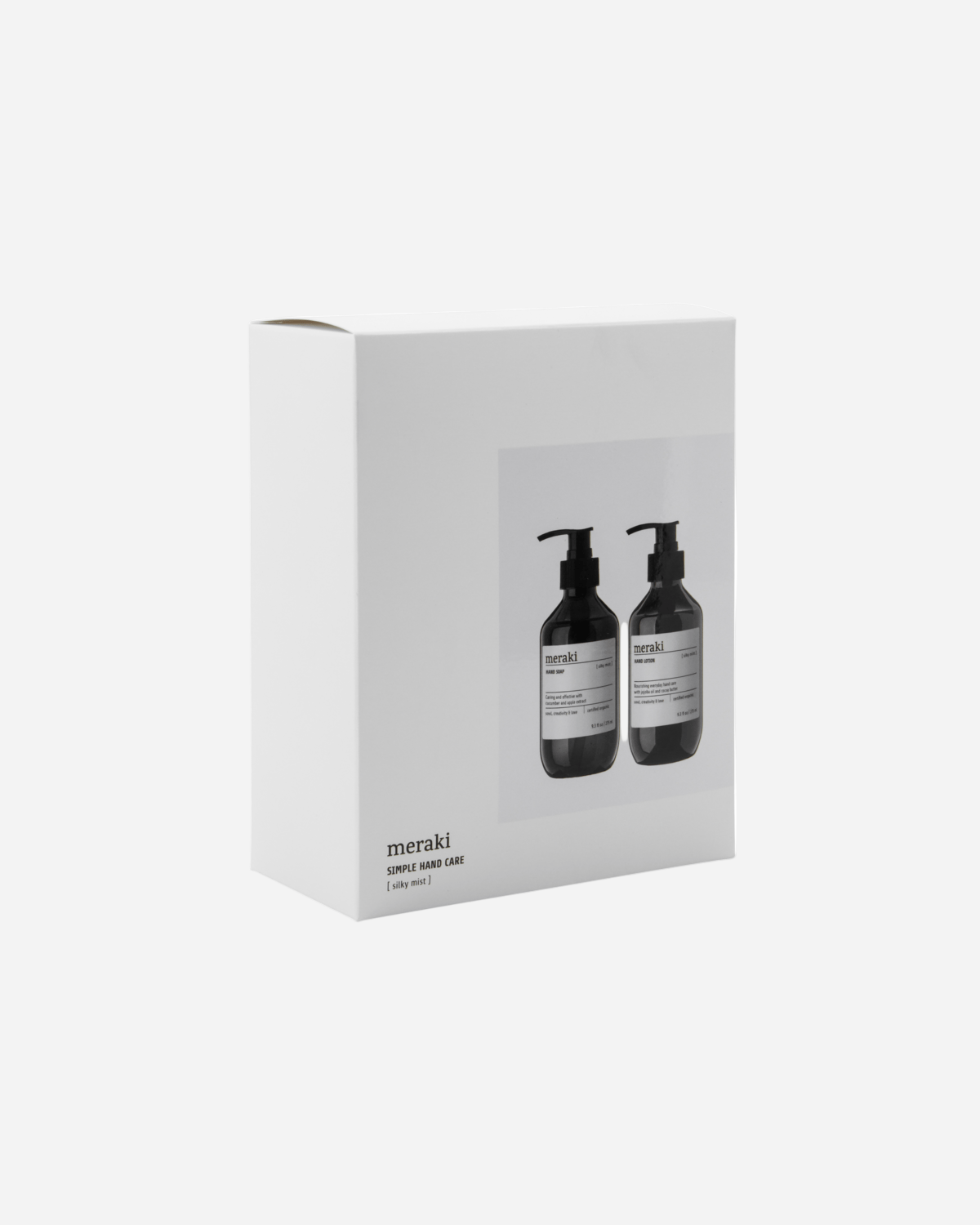 White box with two black bottles labeled 'meraki' on a white background