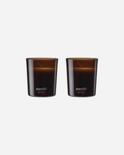 Two brown glass candles 