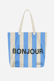 Tote bag with blue and beige stripes and 'Bonjour' text on a white background