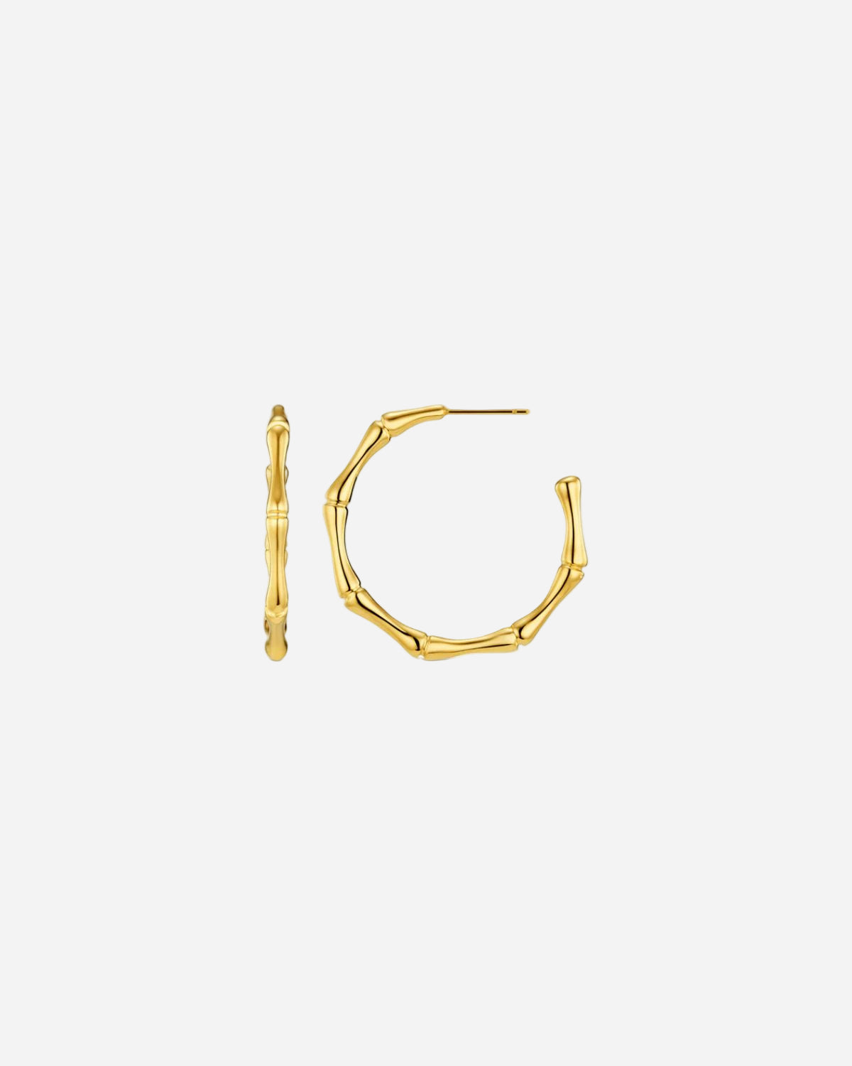 Gold hoop earrings on a white background