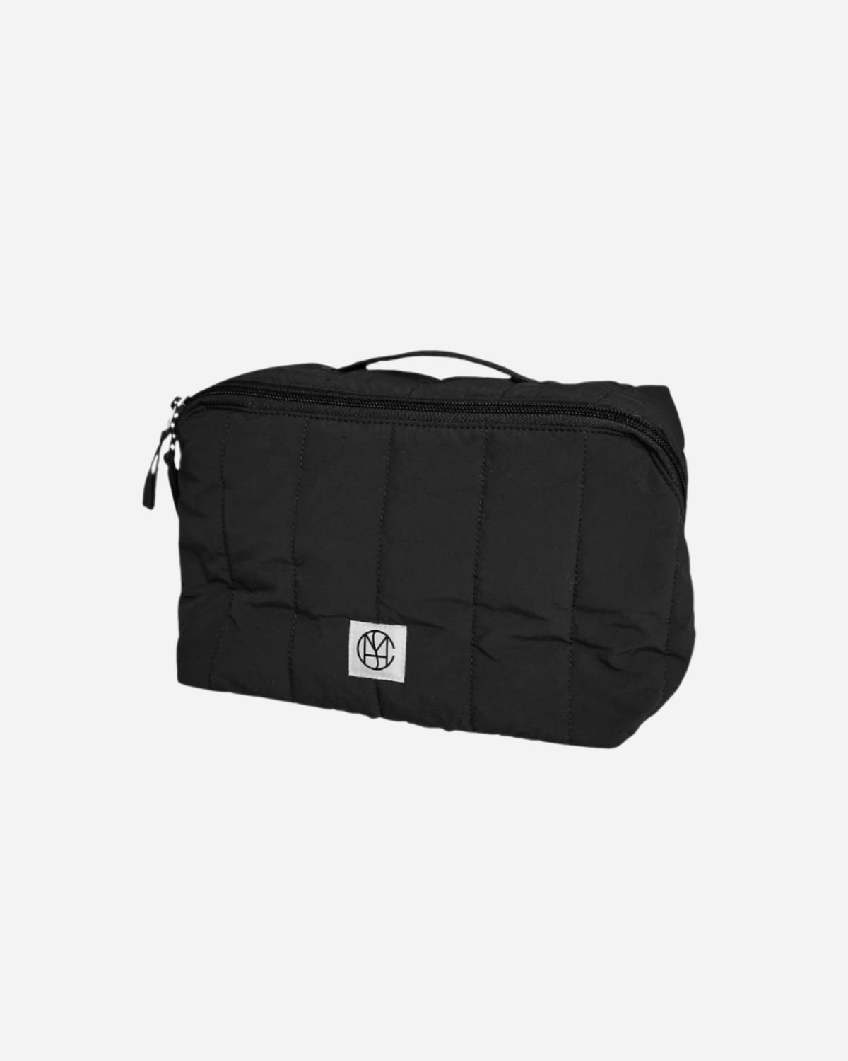 Black toiletry bag with a visible brand logo on a light gray background