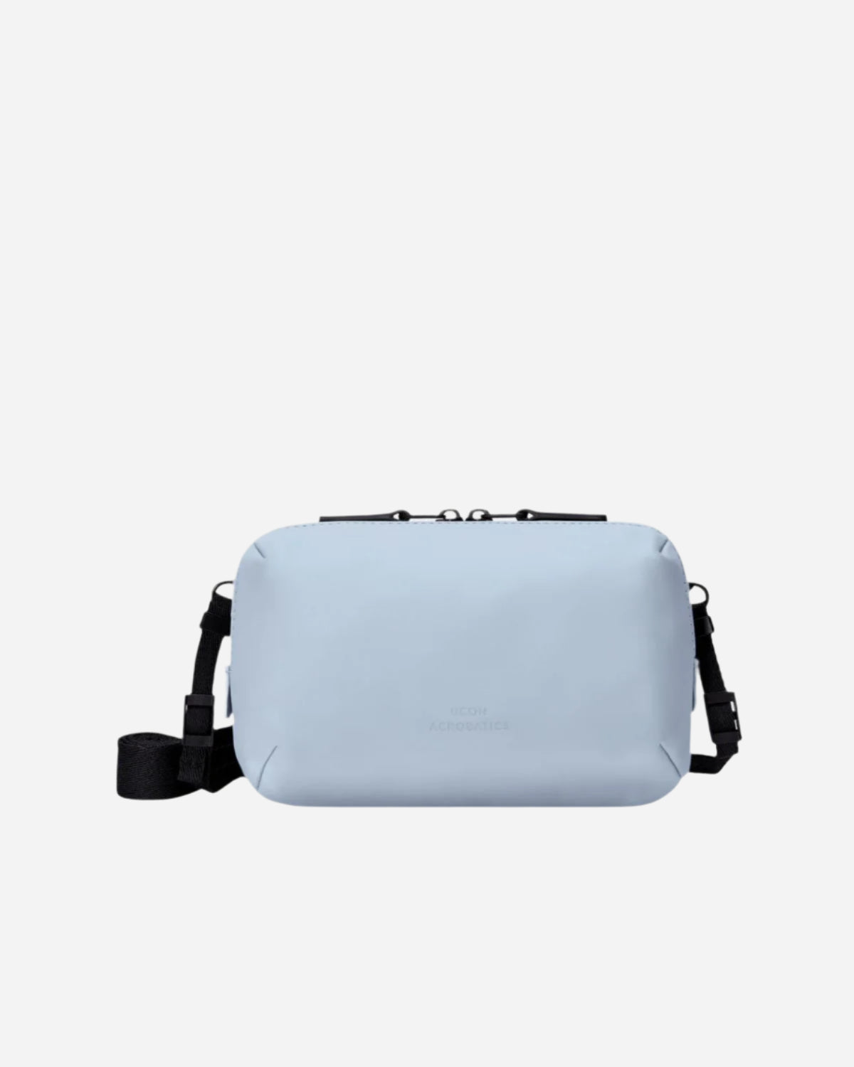 Light blue crossbody bag with black zip and strap
