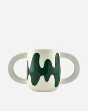 White plant pot with handles and green abstract design on a white background