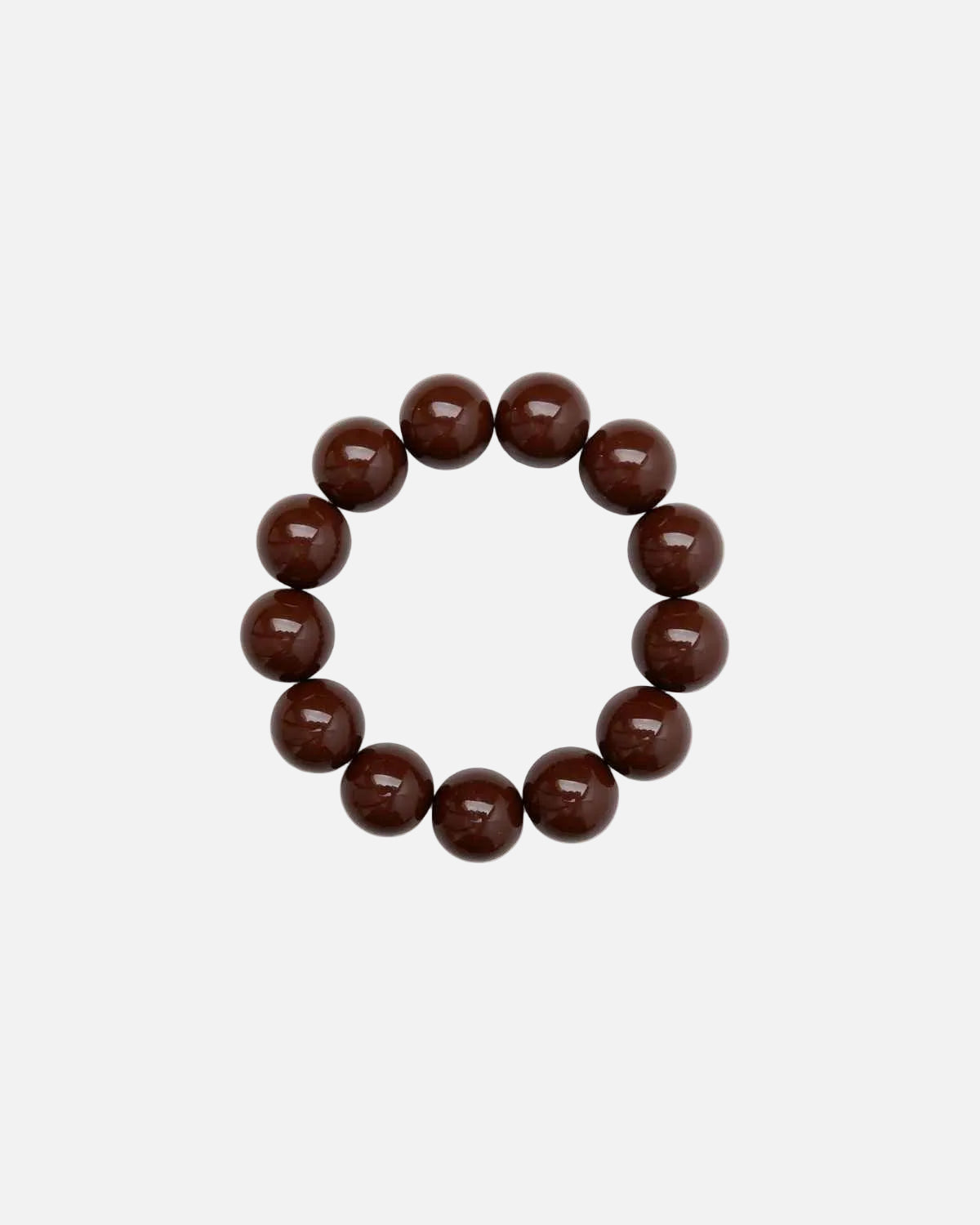 A beaded bracelet made of glossy, dark brown round beads.