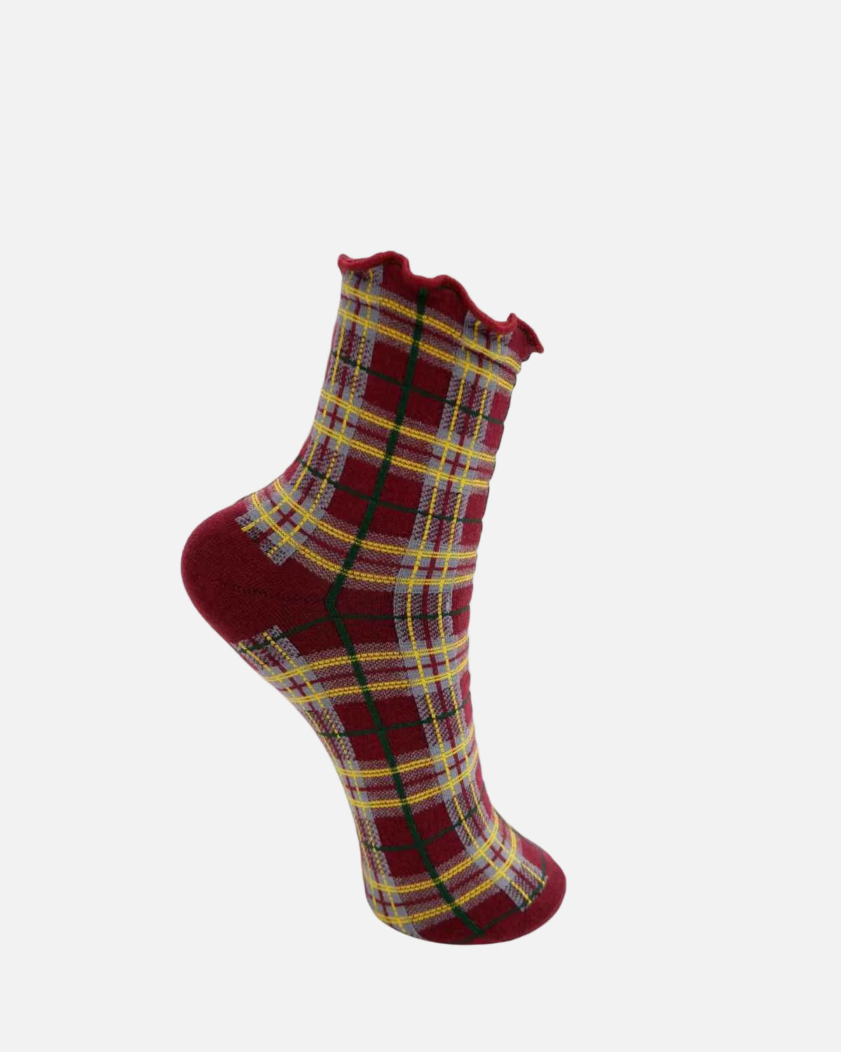 A single red knit sock with a yellow, green, and black plaid pattern and a ruffled edge, shown on a plain white background.