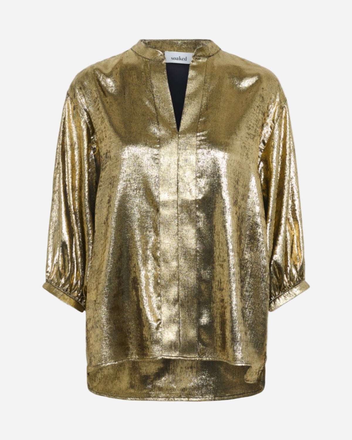 Gold metallic blouse on a white background
