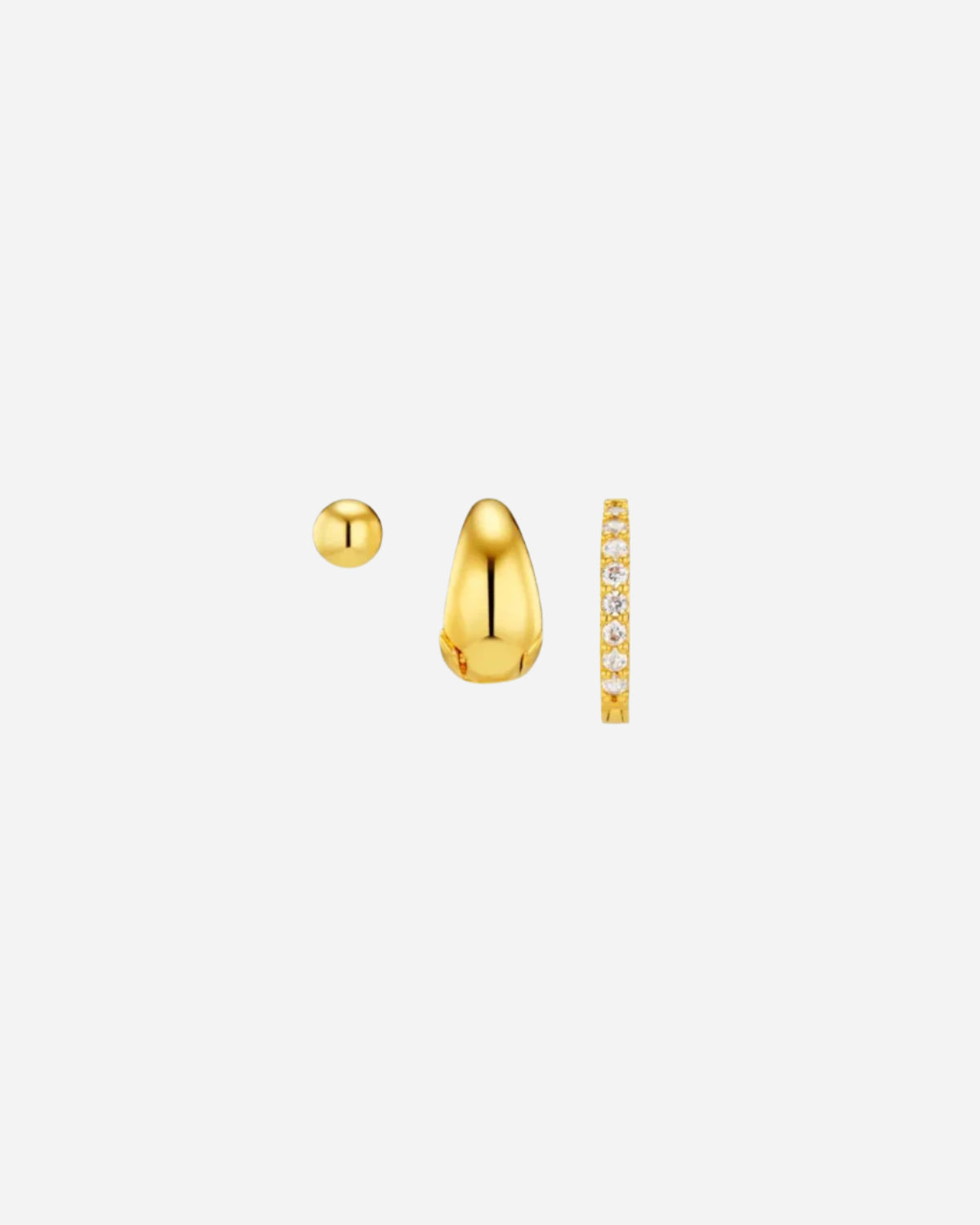 Three gold earrings on a white background