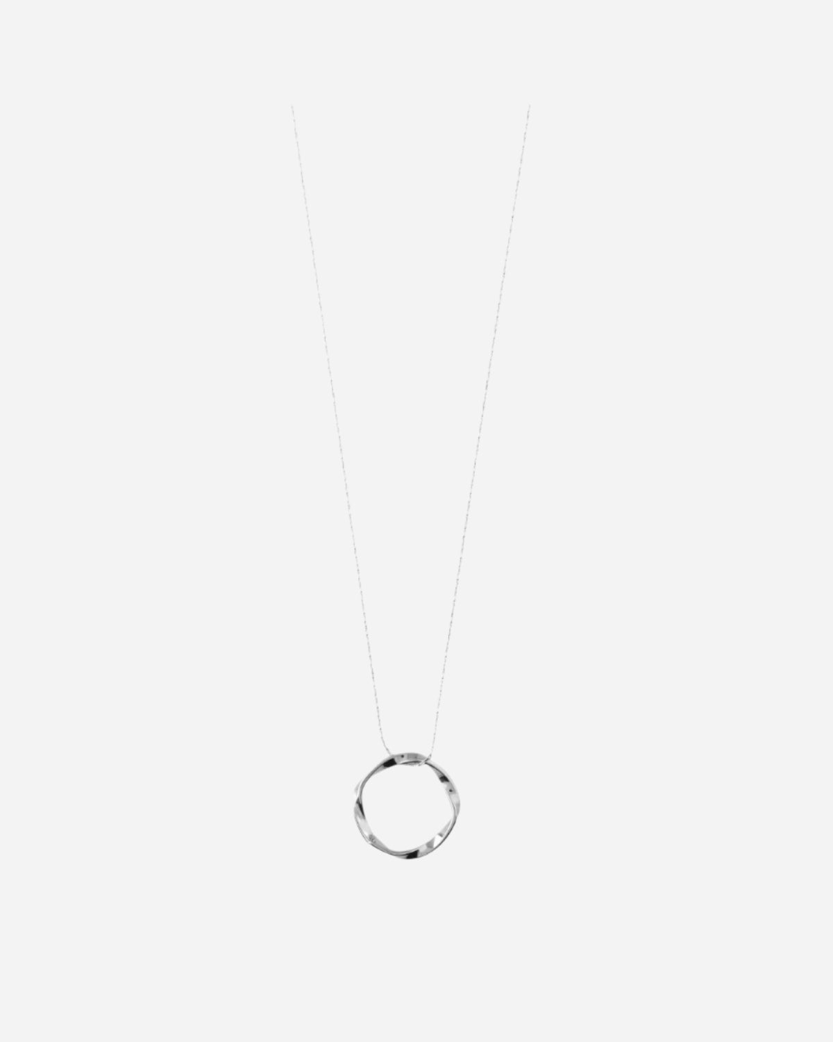 Minimalist silver necklace on a white background