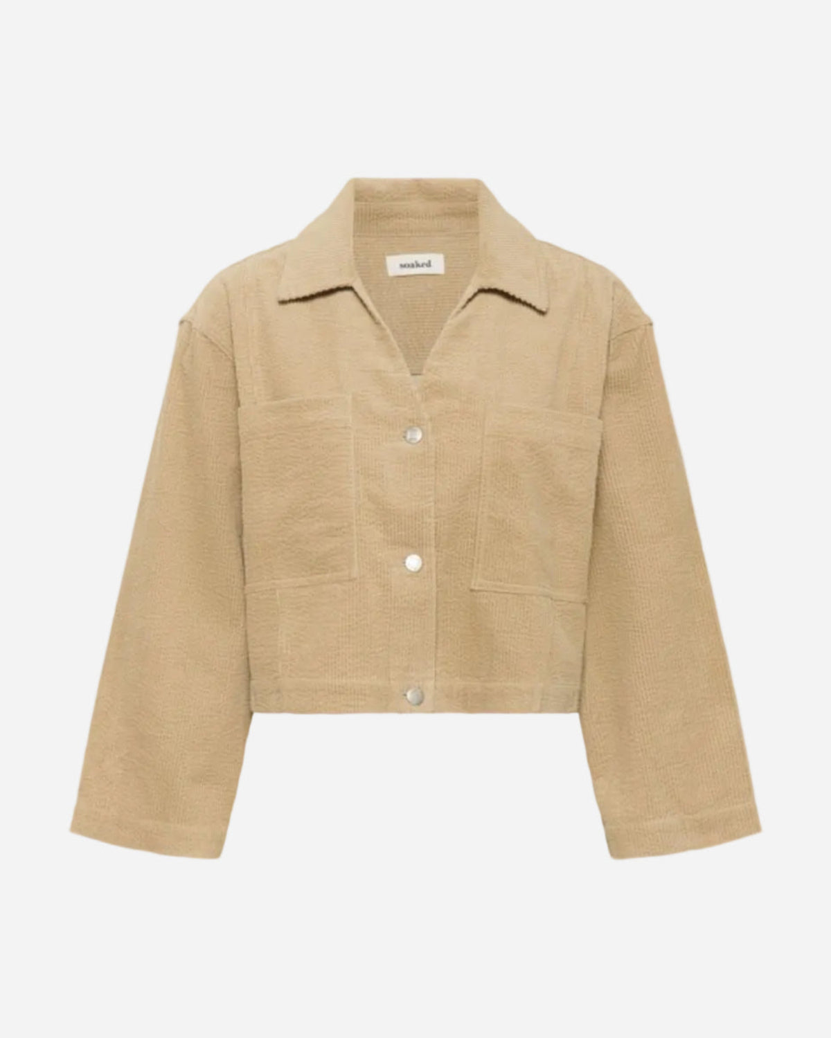Beige corduroy shirt jacket on a white background