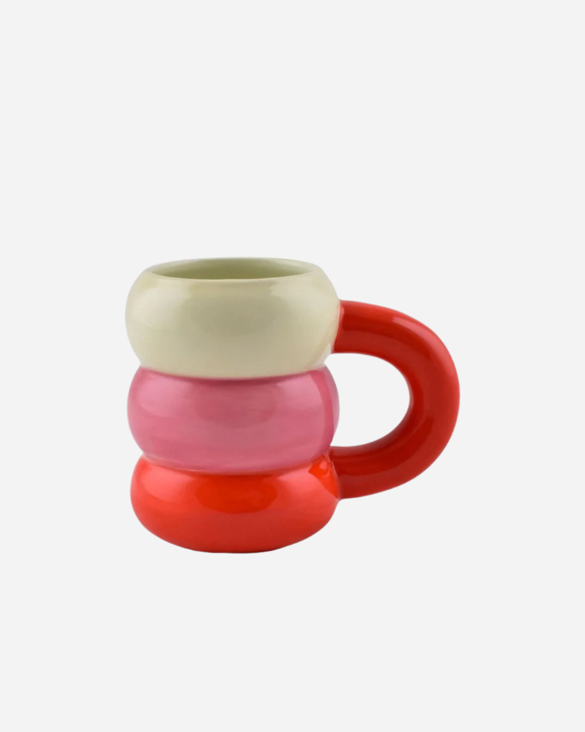 Colorful mug with a red handle on a white background