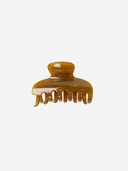 MUSTARD hair clip on a white background