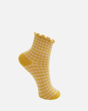 A single yellow and white gingham check ankle sock with a scalloped ruffle edge and solid yellow heel, toe, and sole, shown on a plain white background.